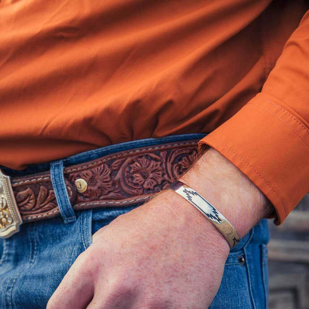 Western Ways Men's Southwestern Cuff Bracelet worn on a man's wrist, showcasing a stylish accessory with southwestern design.