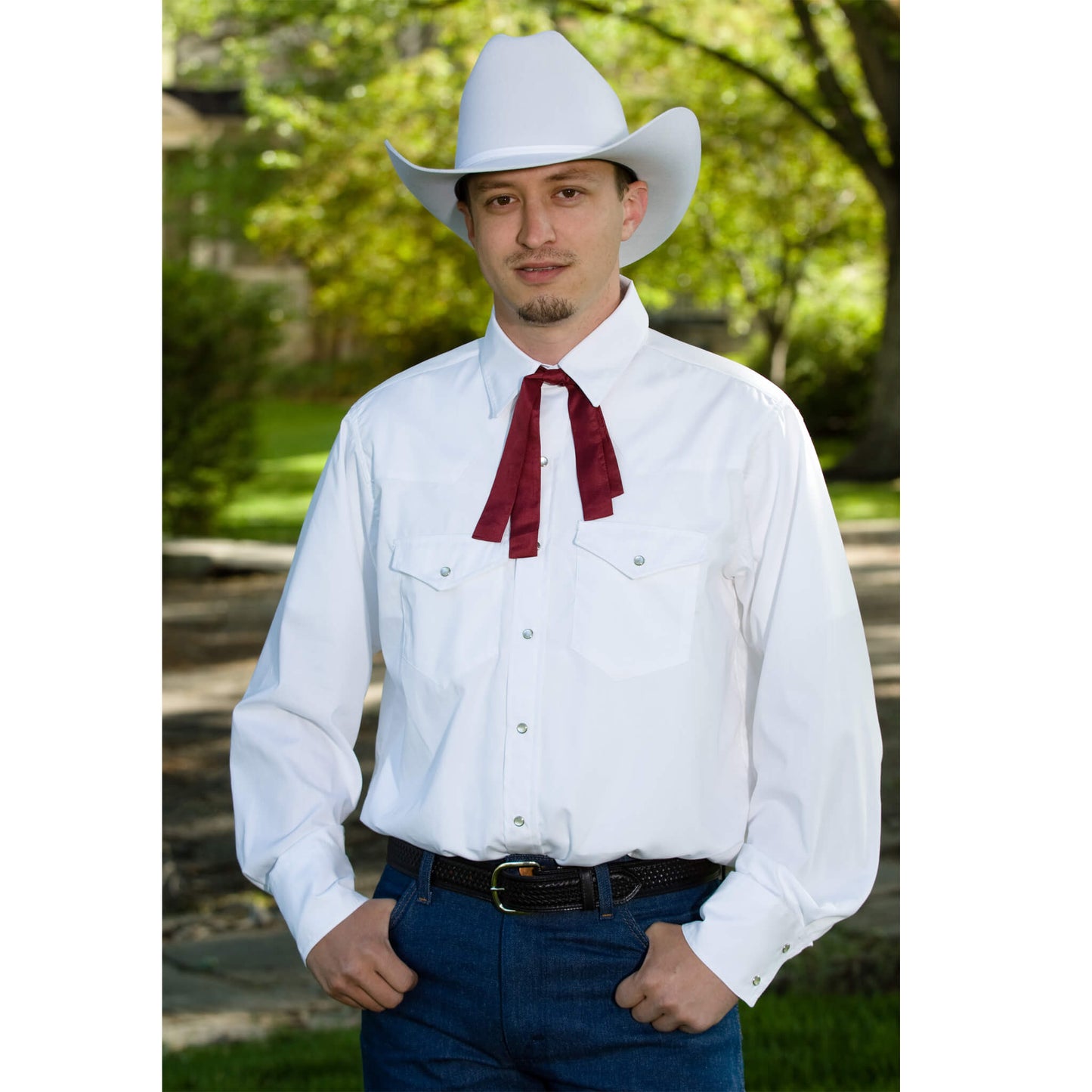 Live in the spirit of the old west with this traditional men’s shirt. This handsome shirt is decorated with pearl snaps, front and back yokes. Two snap-closed flap pockets and a crisp tailored collar. Dress it up with our arm garter , silk western tie or silver bolo ties. 100% Cotton. Made in USA.