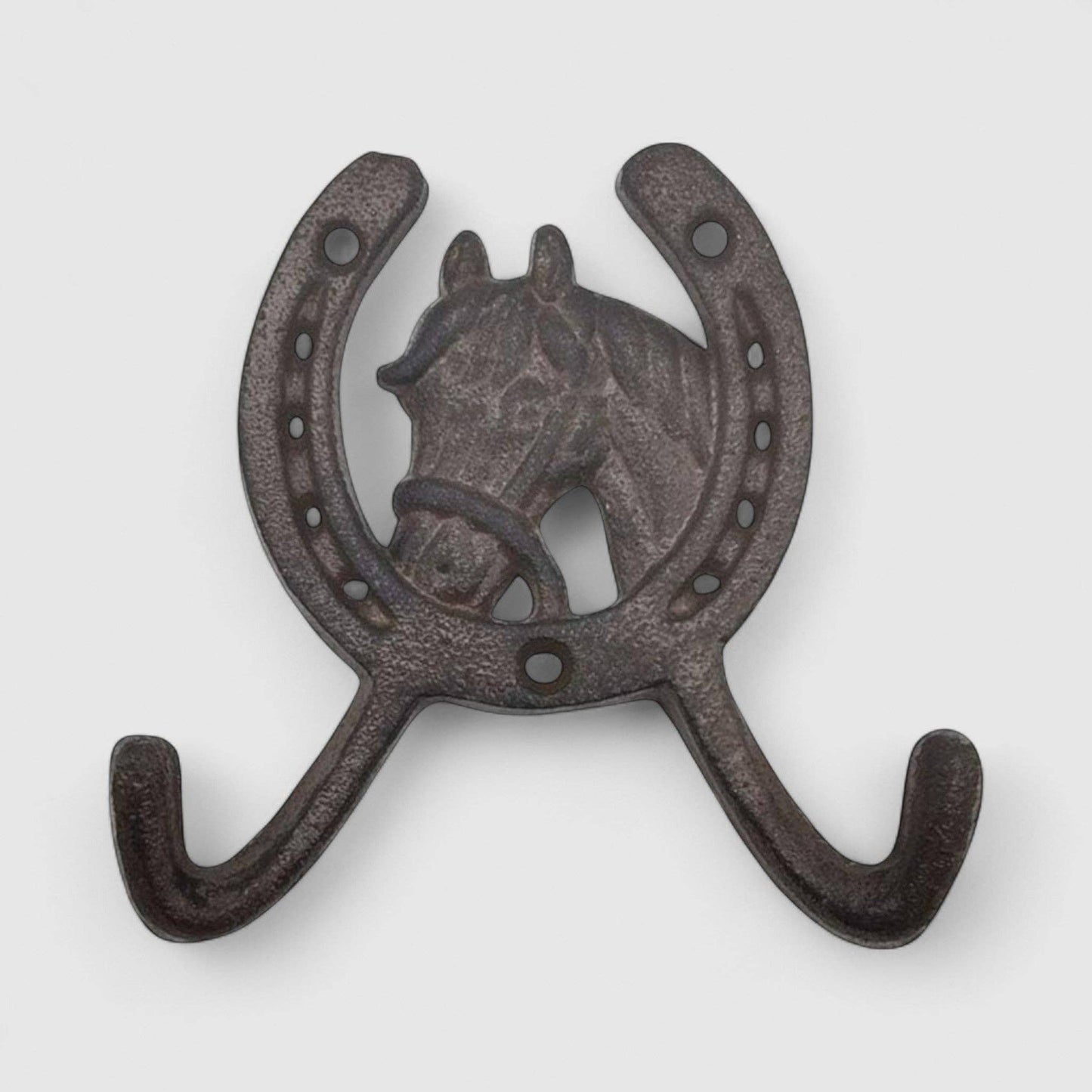 Decorative wall hook with horse design on a white background