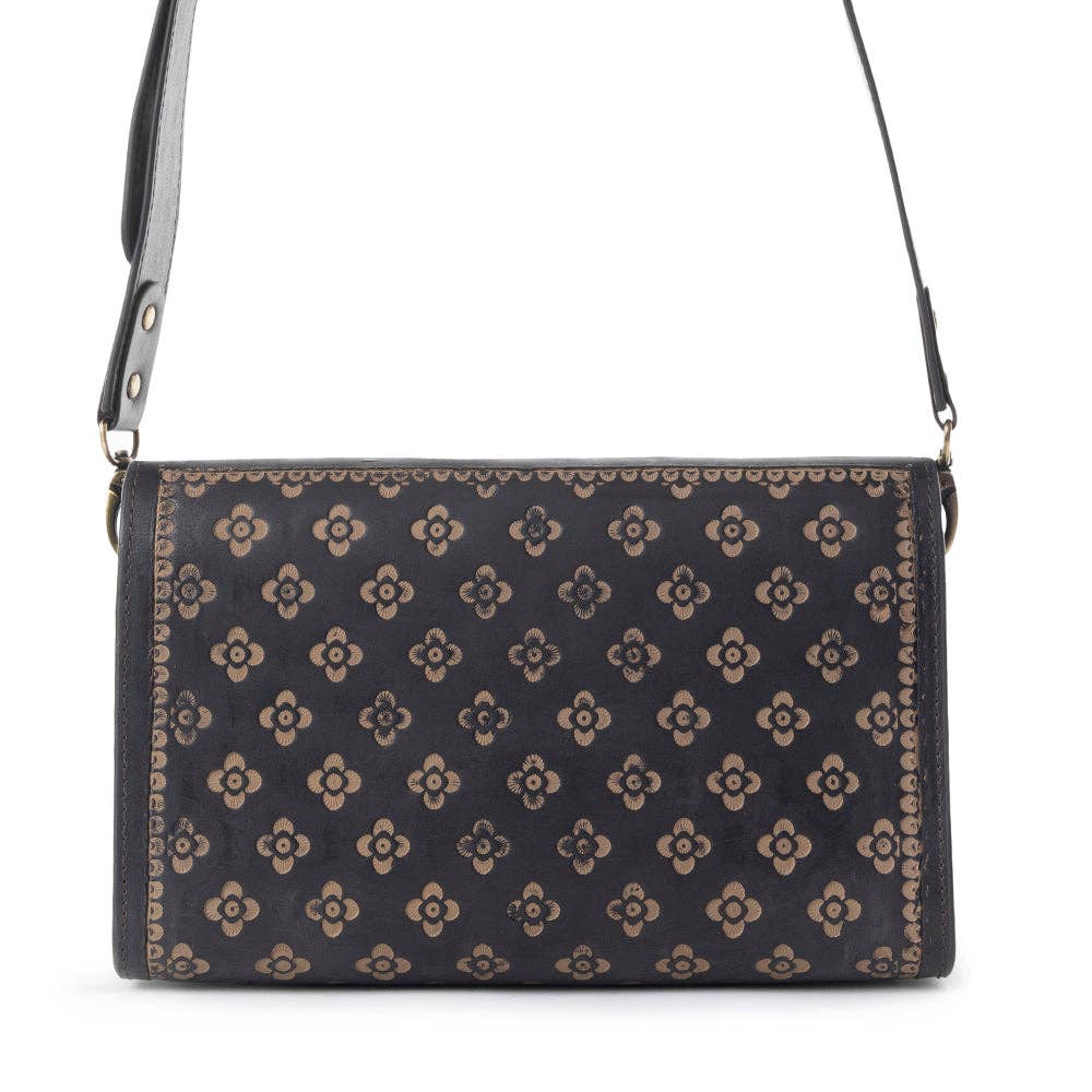 Black handbag with floral pattern on a white background
