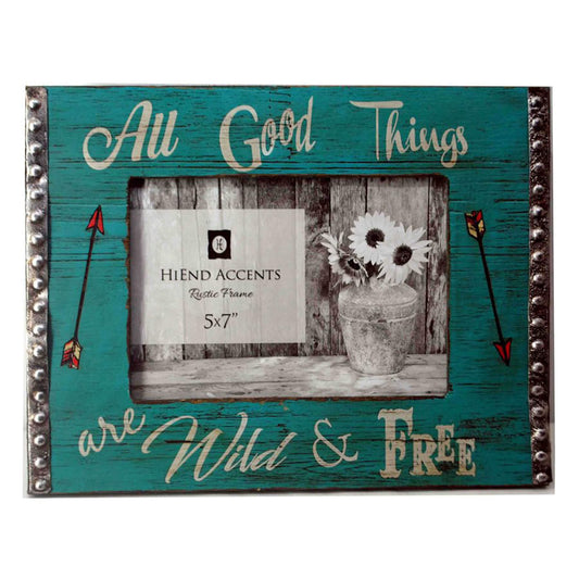 Created to remind us to stay "wild and free", this printed turquoise wooden frame gives the appearance that it has been in your family for years. With silver metal edging, it can be utilized only with horizontal photographs. For photographs measuring 5" X 7". Back has swing tabs for easy installation, and a thick layer of glass protects your image. Measures approximately 9.75" X 8". Imported