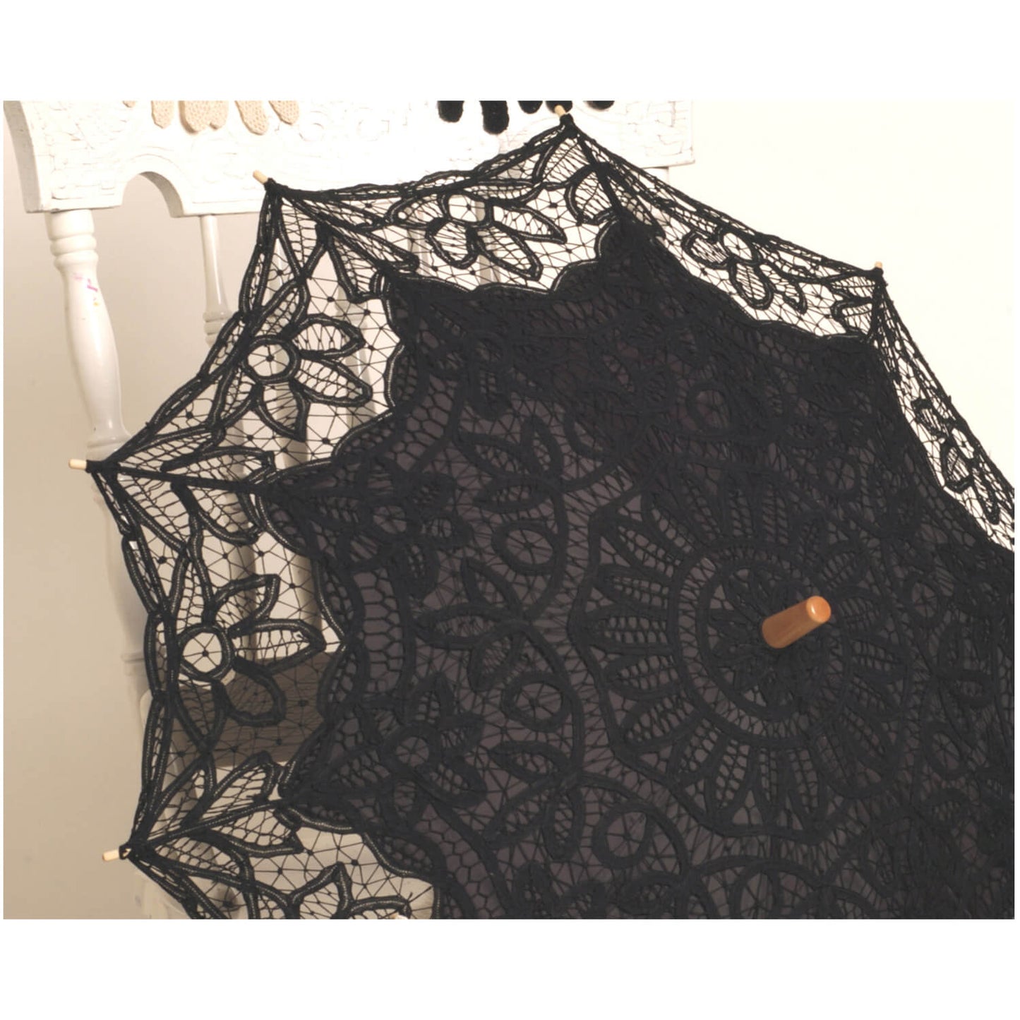 Women from all social standings carried parasols in the summer for functional use to keep them cool and protect their fair skin. We carry three colors to compliment your outfit, now in black, white and ecru Battenberg lace.