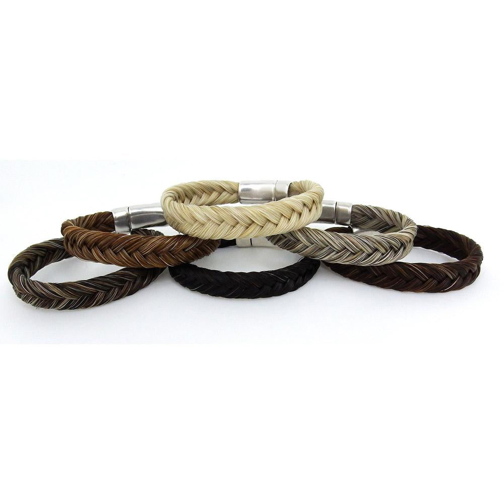 This fine craftsmanship of braided horsehair is a great piece to layer with other jewelry. Finished with a sturdy magnetic clasp, it is designed to be worn fitted vs loose. You can get the bracelet wet, but we recommend you remove it to swim or shower. These seven strand braided bracelets look sleek and modern when accented with the stainless steel magnetic clasps. 