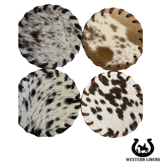 Add natural rustic charm to your home with Cowhide Coasters. These round coasters are crafted from genuine cowhide leather and finished with a leather lace whipstitch trim for a stylish, handmade look.