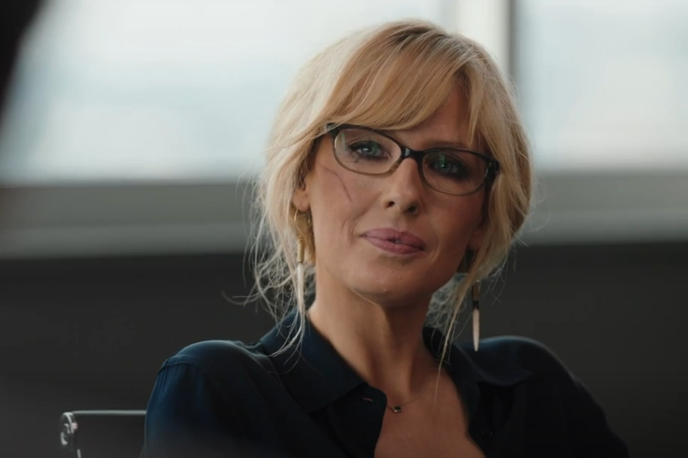 Woman wearing glasses with a blurred background