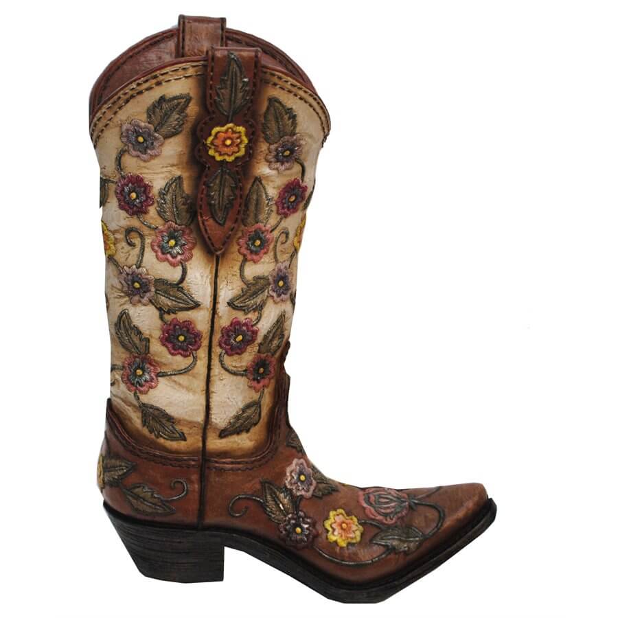 Adorned with a fun, fanciful design, this resin Flower Cowboy Boot Vase holds your artificial flowers with western style. The floral elements help to add a soft, feminine note for a twist on western elegance. Not intended for use with water. Hand painted, cast resin.  Measurement: 13" x 9" x 3"