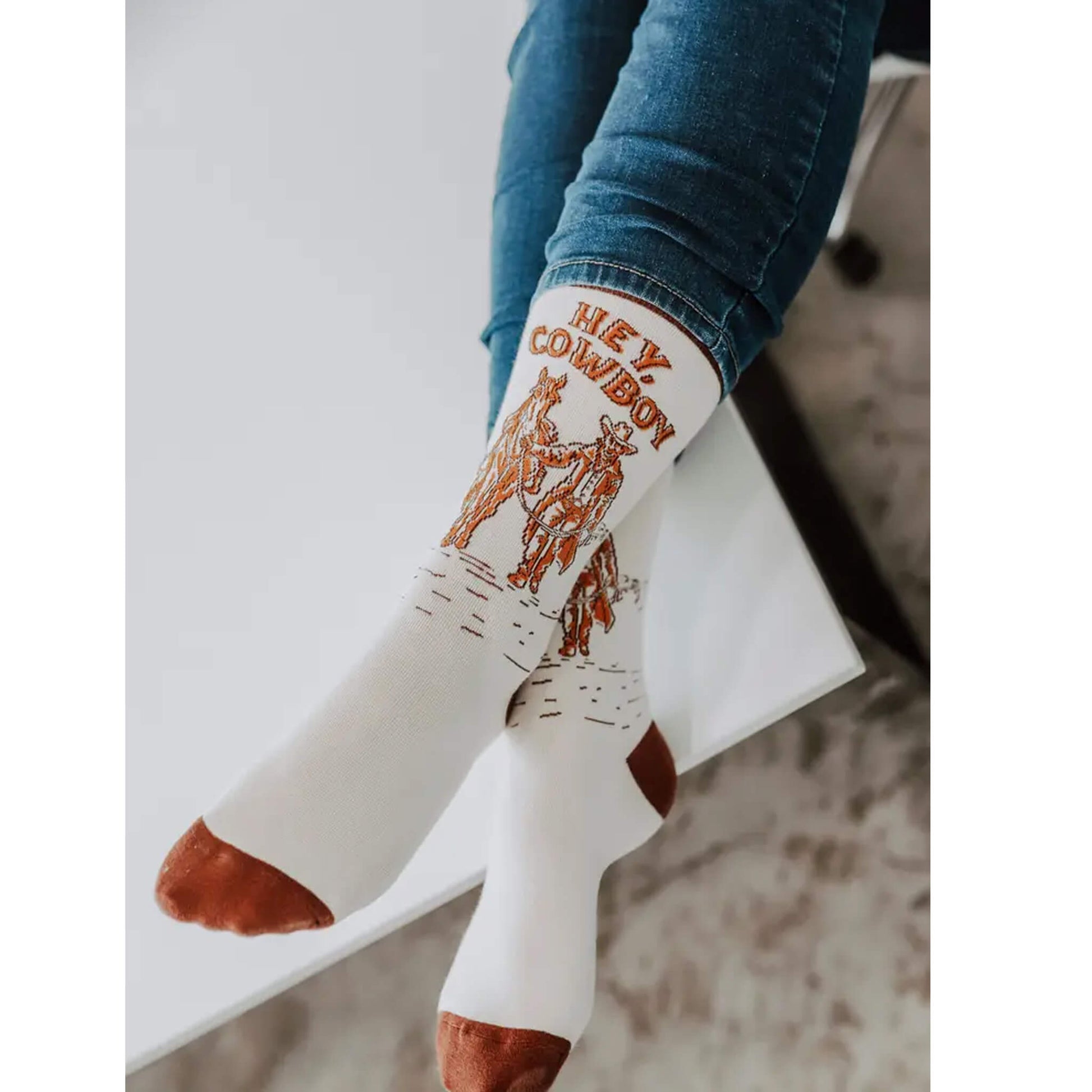 The perfect cozy socks for that cowboy lover ;) Make a great gift! USA Women's 6-12 USA sizes. Fabric: 78% combed cotton, 16% polyester, 4% spandex , 2% nylon. Made in USA.