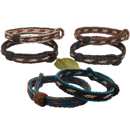 These braided horsehair bracelets for men or ladies are easy to wear. They adjust to any size wrist so they fit comfortably. Sold in sets of two. Order the burgundy, brown and black or turquoise set. Makes a great gift!