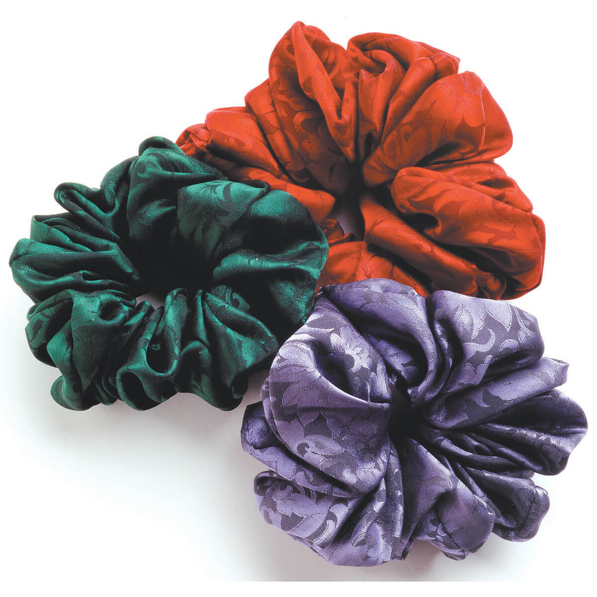 The ever popular silk hair scrunchie is available in the same 13 beautiful jacquard colors as our silk scarves.