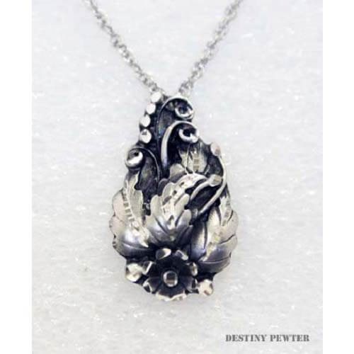 Destiny pewter jewelry are made of fine jeweler's pewter that is extremely lightweight and has a brilliant shine. each piece is handmade and hand finished with diamond cuts. The sparkly cuts give each piece a unique dazzling sparkle. Approximately 1-1/2" on an 18" chain. Made in USA