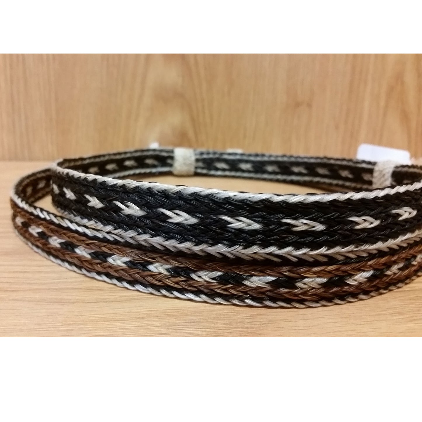 Dress your favorite hat in style! These hat bands are made from high quality genuine horse hair that has been intricately hand braided and built to last and as tough as it is good looking. Hatband measures ½" wide and adjustable from 27" round to as small as 14" round. Made in genuine natural colored horsehair. Horsehair color may vary from shown Order by Color.