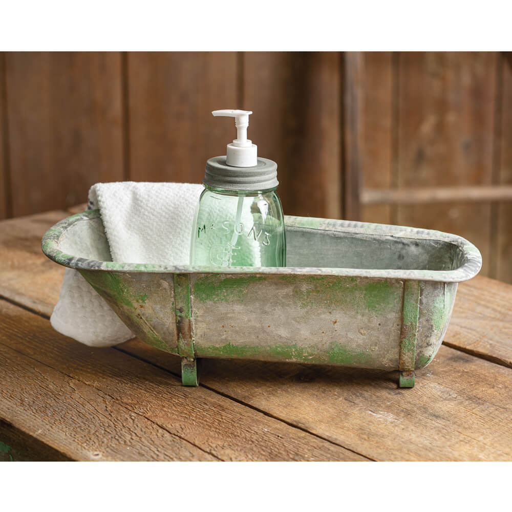 This charming metal tub is great for displaying bath items or to hold potted plants. Accessories are not included. Measurement: 17½''W x 8''D x 5¾''H